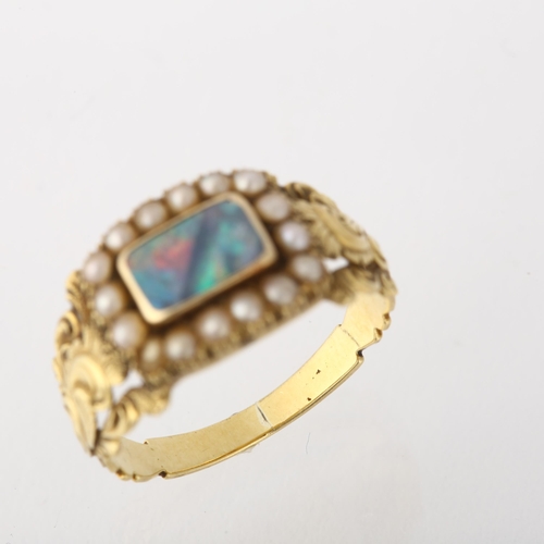 1248 - A Georgian opal doublet? and split pearl cluster mourning ring, circa 1820, the central panel with o... 