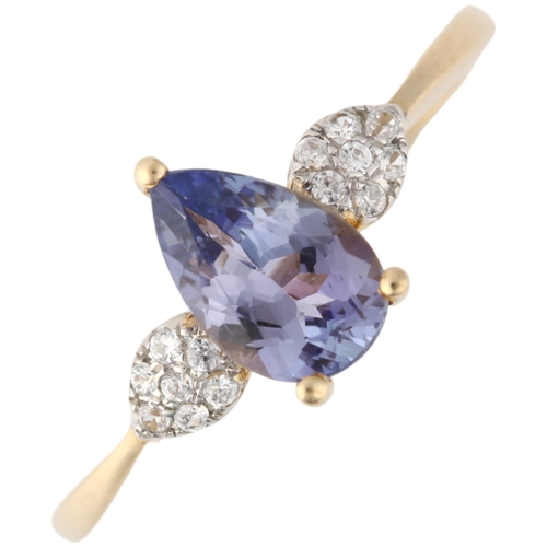 1249 - A 9ct gold tanzanite and cubic zirconia dress ring, claw set with pear-cut tanzanite, setting height... 