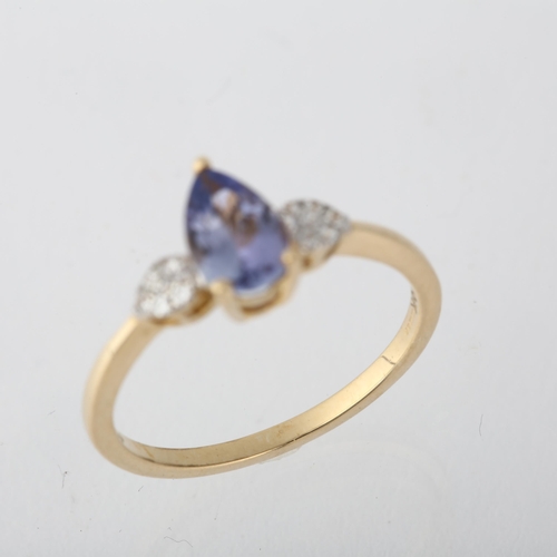 1249 - A 9ct gold tanzanite and cubic zirconia dress ring, claw set with pear-cut tanzanite, setting height... 