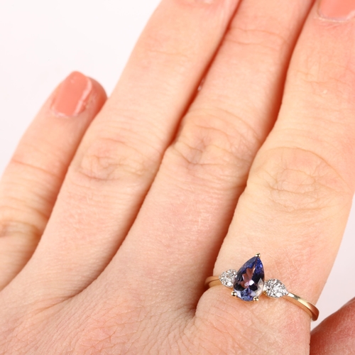 1249 - A 9ct gold tanzanite and cubic zirconia dress ring, claw set with pear-cut tanzanite, setting height... 