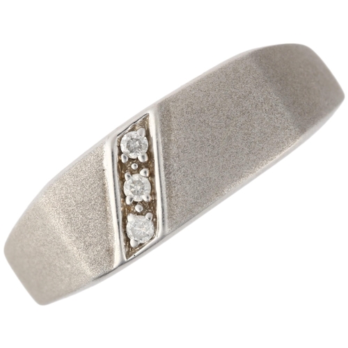 1259 - A 9ct white gold diamond signet ring, maker DK, Birmingham 2006, pave set with modern round brillian... 