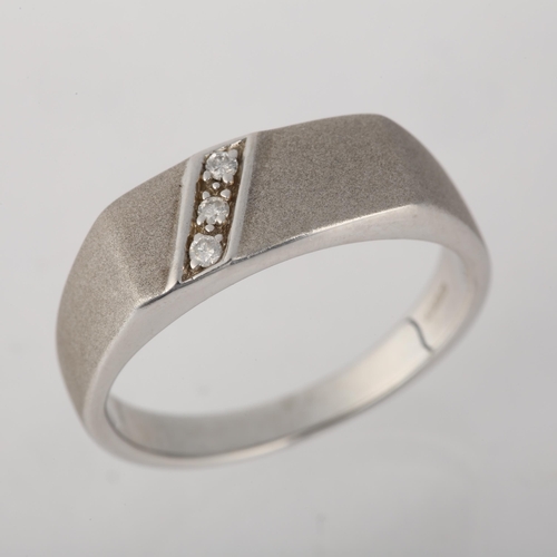 1259 - A 9ct white gold diamond signet ring, maker DK, Birmingham 2006, pave set with modern round brillian... 