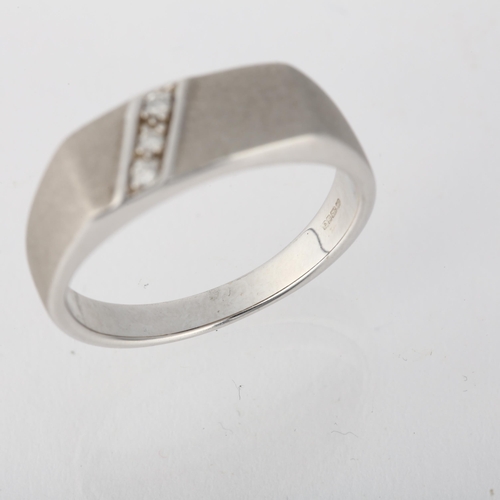 1259 - A 9ct white gold diamond signet ring, maker DK, Birmingham 2006, pave set with modern round brillian... 