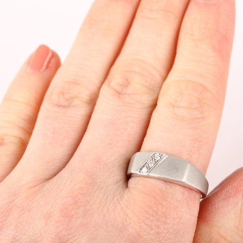 1259 - A 9ct white gold diamond signet ring, maker DK, Birmingham 2006, pave set with modern round brillian... 