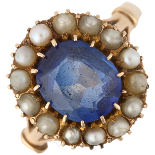 1265 - An early 20th century blue paste and pearl cluster ring, apparently unmarked, setting height 14.2mm,... 