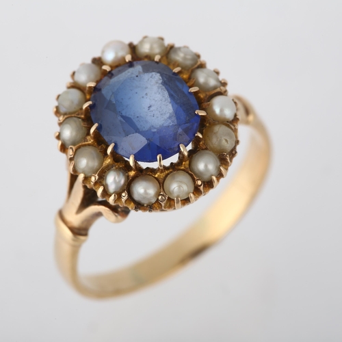 1265 - An early 20th century blue paste and pearl cluster ring, apparently unmarked, setting height 14.2mm,... 