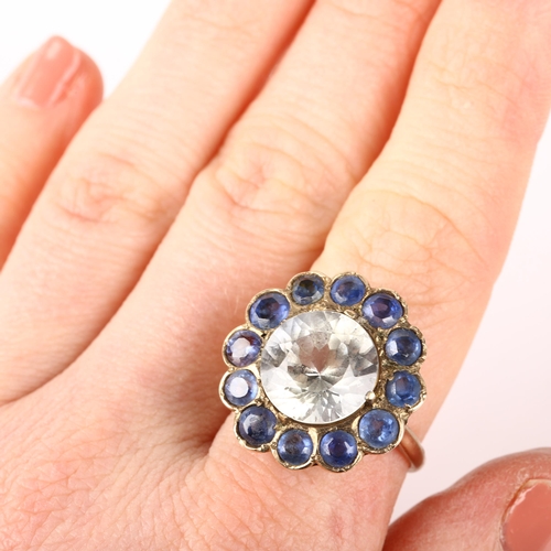 1266 - A large late 20th century synthetic sapphire flowerhead cluster ring, set with round-cut white and b... 