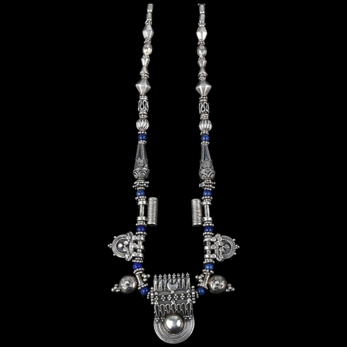 1370 - An Indonesian silver and lapis lazuli Indian talisman fringe necklace, 42cm, 43g