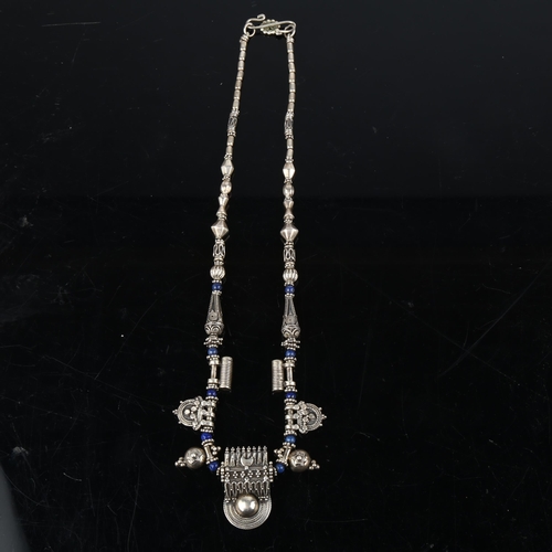 1370 - An Indonesian silver and lapis lazuli Indian talisman fringe necklace, 42cm, 43g