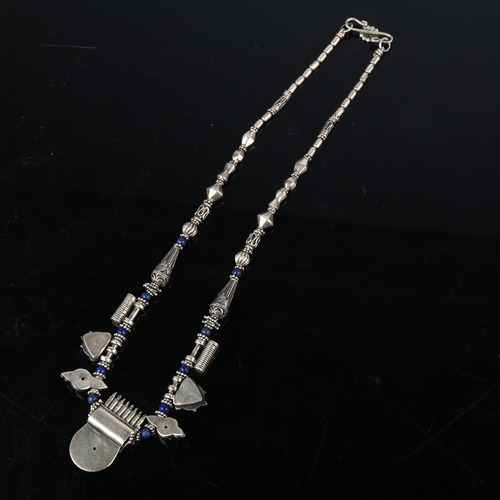 1370 - An Indonesian silver and lapis lazuli Indian talisman fringe necklace, 42cm, 43g