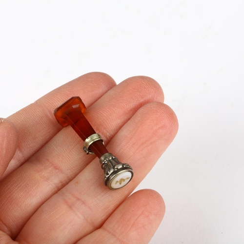 1371 - A Victorian carnelian fob seal, intaglio engraved with heart and arrow, 30.8mm, 2.7g