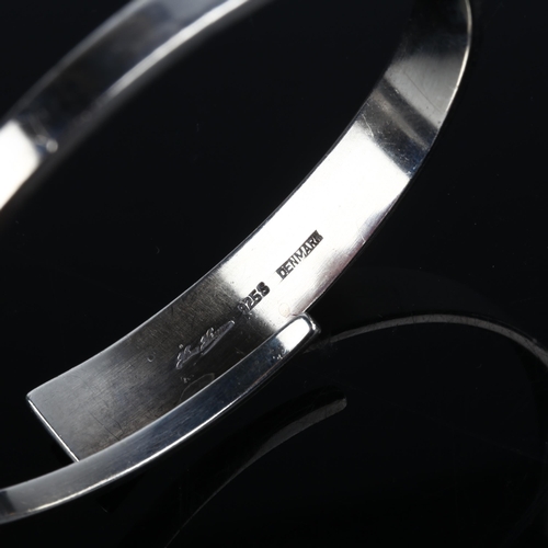 1380 - HANS HANSEN - a large Danish modernist sterling silver torque bangle, setting height 12.2mm, interna... 