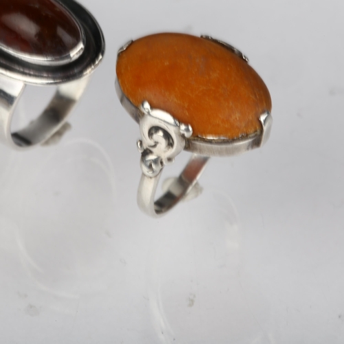 1384 - 3 Danish silver and amber rings, makers include Niels Erik From, sizes J, N, and V, 13.8g total (3)