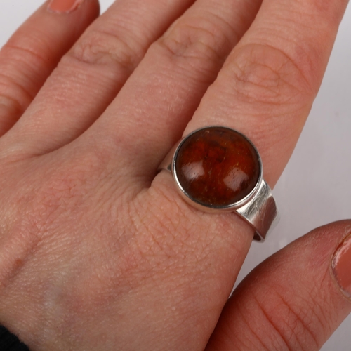 1384 - 3 Danish silver and amber rings, makers include Niels Erik From, sizes J, N, and V, 13.8g total (3)