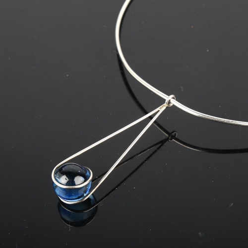 1402 - NIELS ERIK FROM - a Danish modernist sterling silver blue glass orb pendant torque necklace, pendant... 