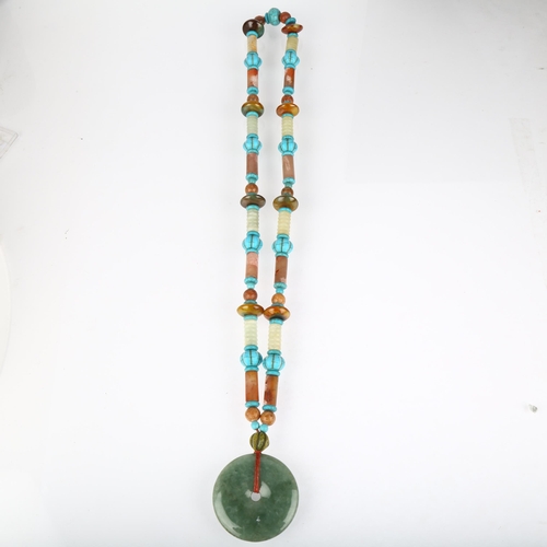 1405 - A large Chinese jade and serpentine bi disc necklace, diameter 55.2mm, necklace 70cm, 170g