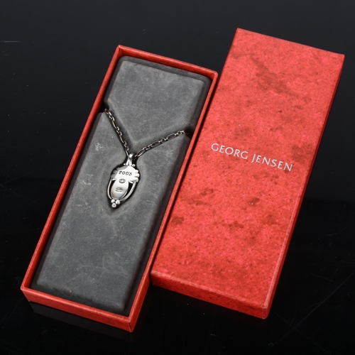 1411 - GEORG JENSEN - a Danish sterling silver Pendant of the Year 2003 necklace, in Art Deco style, pendan... 