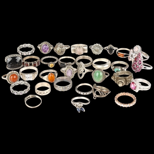 1428 - A quantity of silver stone set rings