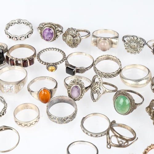 1428 - A quantity of silver stone set rings