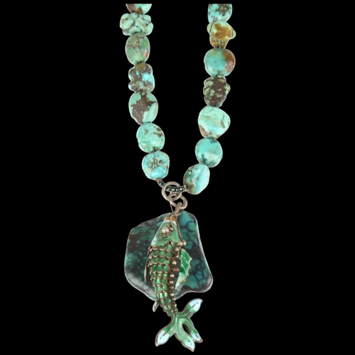 1434 - A single-strand graduated turquoise matrix bead necklace, with enamel articulated fish pendant, 36cm... 