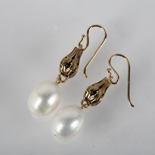 1268 - A pair of pearl drop earrings, unmarked gold shepherd hook fittings, 41mm, 6.9g