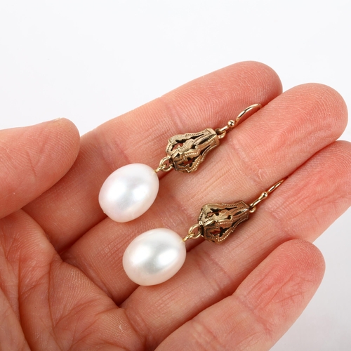 1268 - A pair of pearl drop earrings, unmarked gold shepherd hook fittings, 41mm, 6.9g