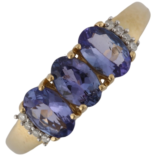 1280 - A modern 9ct gold tanzanite and diamond half hoop ring, setting height 6mm, size N, 2.1g