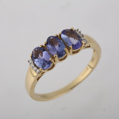 1280 - A modern 9ct gold tanzanite and diamond half hoop ring, setting height 6mm, size N, 2.1g