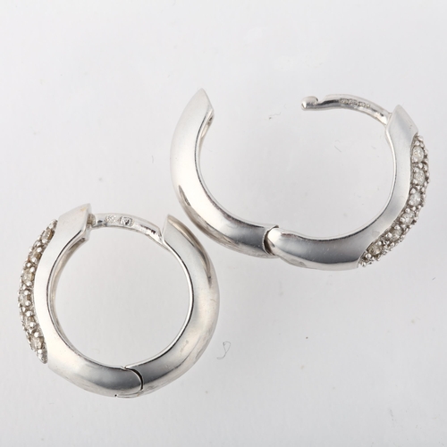 1285 - A pair of 9ct white gold diamond hoop earrings, total diamond content approx 1ct, 17mm, 8.1g