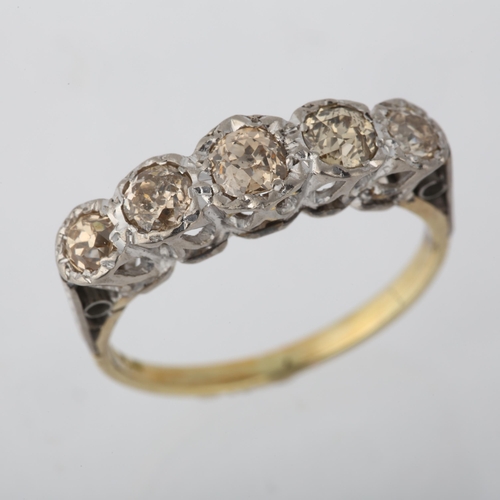 1286 - An 18ct gold graduated five stone diamond half hoop ring, platinum-topped, illusion set with old Eur... 