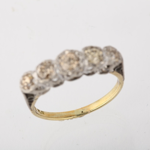 1286 - An 18ct gold graduated five stone diamond half hoop ring, platinum-topped, illusion set with old Eur... 