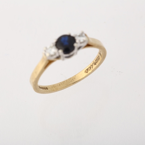 1287 - A 9ct gold three stone sapphire and diamond ring, setting height 4.7mm, size M, 2.1g