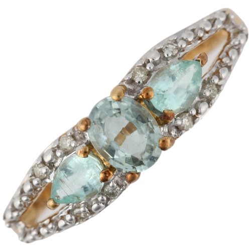 1290 - A modern 9ct gold aquamarine and diamond dress ring, setting height 5.4mm, size N, 2.1g