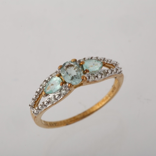 1290 - A modern 9ct gold aquamarine and diamond dress ring, setting height 5.4mm, size N, 2.1g