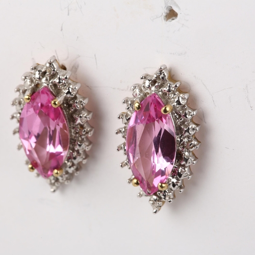 1297 - A pair of 9ct gold synthetic pink sapphire and diamond marquise cluster earrings, with stud fittings... 