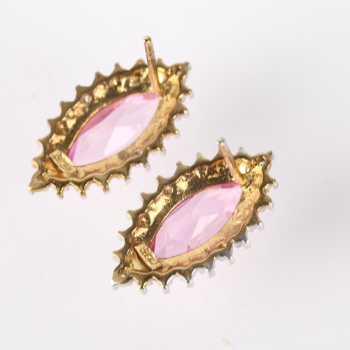 1297 - A pair of 9ct gold synthetic pink sapphire and diamond marquise cluster earrings, with stud fittings... 