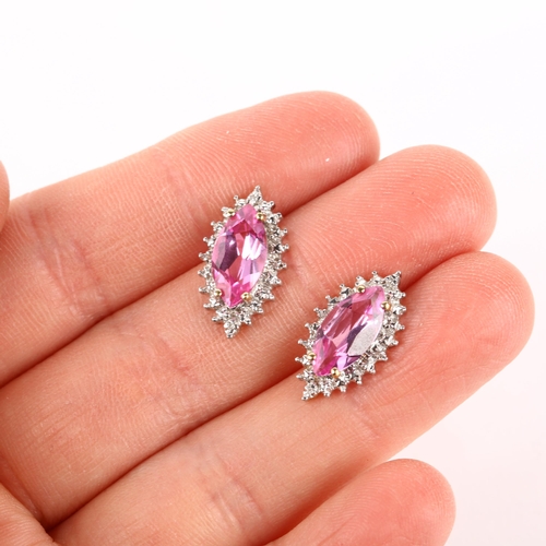 1297 - A pair of 9ct gold synthetic pink sapphire and diamond marquise cluster earrings, with stud fittings... 