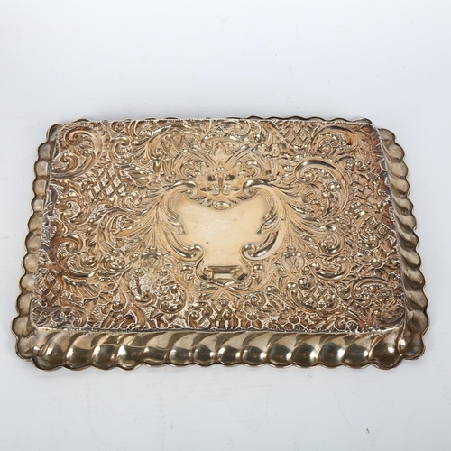 1456 - An Edwardian silver dressing table tray, Henry Matthews, Birmingham 1902, relief embossed green man ... 