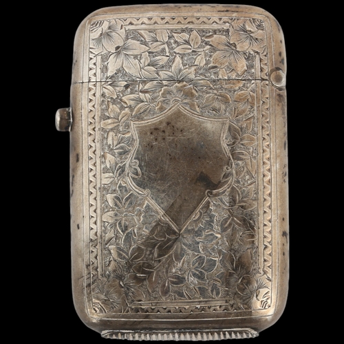 1471 - A Victorian silver Vesta case, George Unite, Birmingham 1883, rectangular form with allover floral e... 