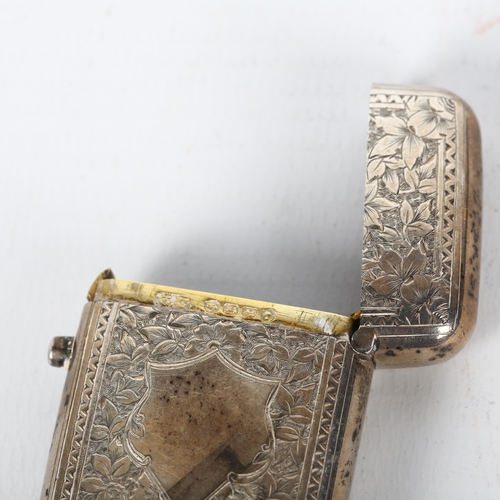 1471 - A Victorian silver Vesta case, George Unite, Birmingham 1883, rectangular form with allover floral e... 