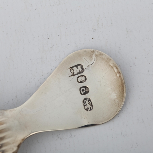 1477 - A George III silver tea caddy spoon, Benjamin Mountigue, London 1790, bright-cut engraved decoration... 