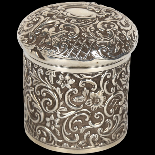 1484 - A late Victorian silver dressing table powder box, Henry Matthews, Birmingham 1895, allover relief e... 