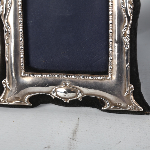 1499 - 2 Elizabeth II silver-fronted photo frames, largest overall 21cm (2)