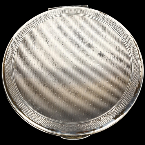 1503 - An Elizabeth II silver compact, allover engine turned decoration, by Kigu Ltd, hallmarks London 1962... 