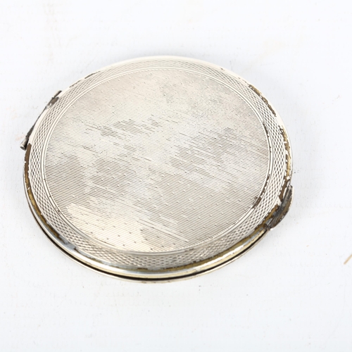 1503 - An Elizabeth II silver compact, allover engine turned decoration, by Kigu Ltd, hallmarks London 1962... 