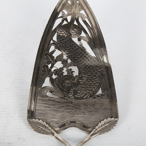 1540 - An 18th century Continental silver fish serving slice, indistinct marks, pierced and bright-cut engr... 