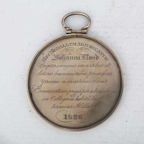 1541 - A 19th century unmarked silver presentation medal to John Lloyd, dated 1826, diameter 6cm