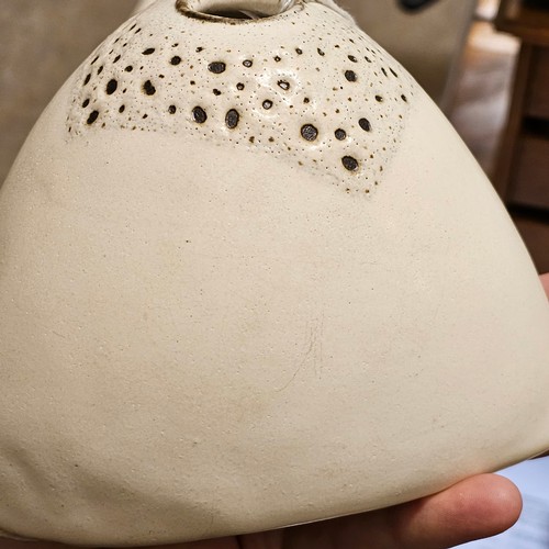 41 - YURIKO HILL (1950-2013), a studio ceramic white glaze organic form stoneware vase with two other sma... 