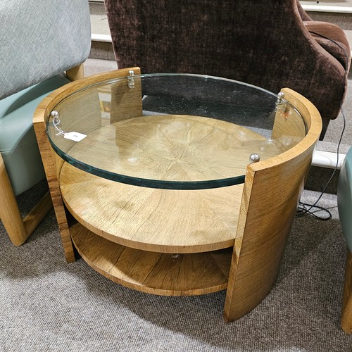 71 - Attributed JACQUES ADNET, an Art Deco 2 tier walnut and glass coffee table, the thick glass held by ... 