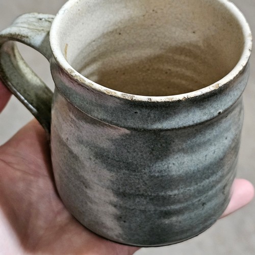 99 - BERNARD LEACH (1887-1979), British, a hand thrown mug made for the Black Mountain Seminar and marked... 